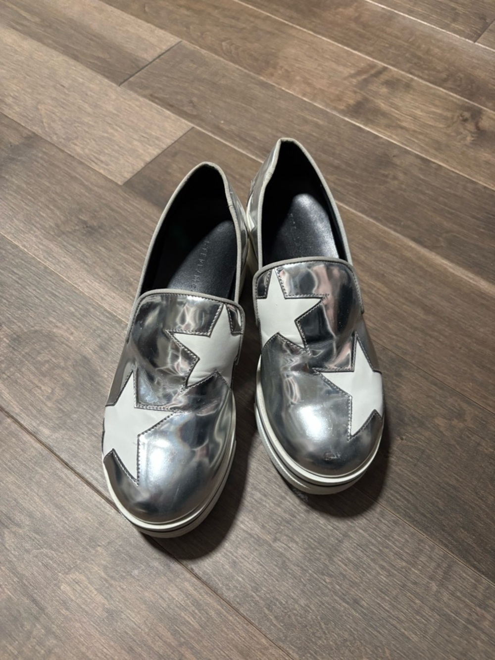 Metallic Silver Slip-On Sneakers with White Star Appliqués